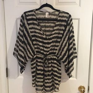 Francesca’s sheer bell sleeve top!